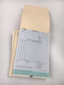 A4 Triplicate NCR book in 50's. Printed black one side with soft manilla cover from head and writing plate from foot. Numbered and Perforated.